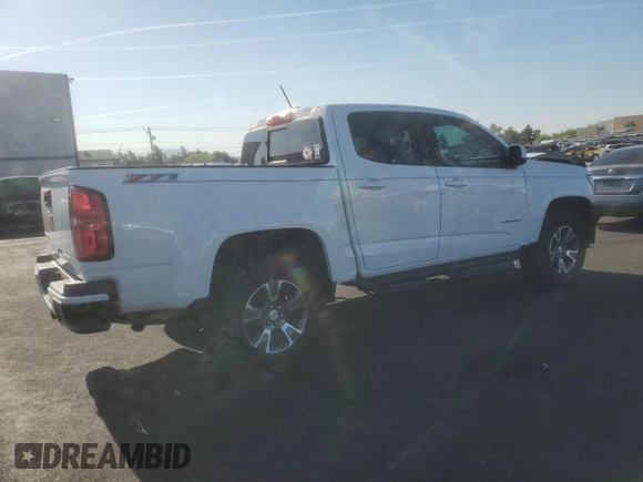 2017 Chevrolet Colorado 4WD Z71 with VIN 1GCGTDEN9H1180800, listed as a Copart auction lot 60430985 with 104,930 mi miles and Salvage title. Bid and sale history available at DreamBid. Image 3.