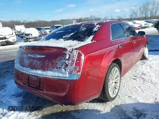 2014 Chrysler 300 with VIN 2C3CCAET9EH104233, listed as a IAAI auction lot 41581466 with 127,772 mi miles. Bid and sale history available at carsss.com. Image 4.