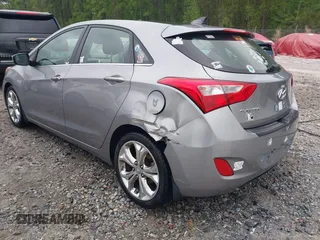 2013 Hyundai Elantra GT with VIN KMHD35LEXDU114448, listed as a IAAI auction lot 41944985 with 71,180 mi miles. Bid and sale history available at carsss.com. Image 3.
