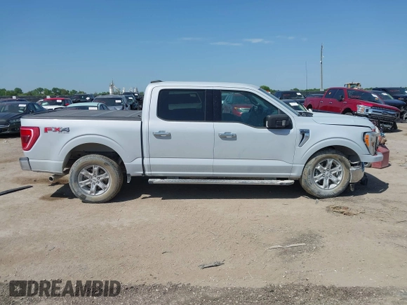 2021 Ford F-150 XL z VIN 1FTFW1E86MKD90402, wystawiony jako IAAI lot #42007680 z przebiegiem 103 724 mil mil oraz . Historia ofert i sprzedaży dostępna na DreamBid. Obrazek 13.