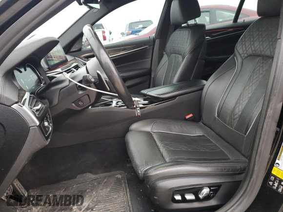 2018 BMW 5 Series M550i xDrive with VIN WBAJB9C56JB049524, listed as a Copart auction lot 43511805 with 55,759 mi miles and Salvage title. Bid and sale history available at DreamBid. Image 7.