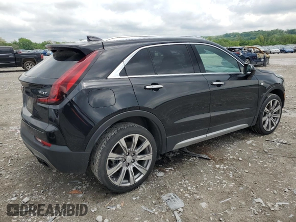2019 Cadillac XT4 FWD Premium Luxury z VIN 1GYFZCR49KF147242, wystawiony jako Copart lot #55483215 z przebiegiem 94 990 mil mil oraz Szkoda całkowita • Salvage title. Historia ofert i sprzedaży dostępna na DreamBid. Obrazek 3.