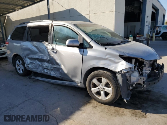 2012 Toyota Sienna LE AAS with VIN 5TDKK3DC8CS259085, listed as a Copart auction lot 73592584 with 198,370 mi miles and Salvage Title. Bid and sale history available at DreamBid. Image 4.