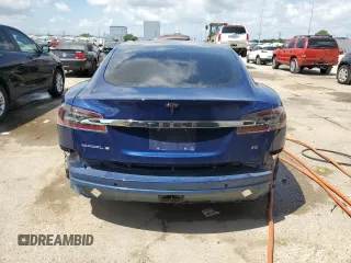 2017 Tesla Model S 60 с VIN 5YJSA1E14HF185924, выставлен на аукционе Copart как лот 57101065 с пробегом 68 268 миль миль и На запчасти • Non repairable. История ставок и продаж доступна на DreamBid. Изображение 6.