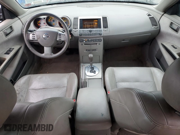 2004 Nissan Maxima SE with VIN 1N4BA41E14C901248, listed as a Copart auction lot 52100375 with 124,473 mi miles and Salvage Title. Bid and sale history available at DreamBid. Image 8.