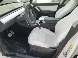 2021 Tesla Model Y Long Range with VIN 5YJYGDEEXMF268300, listed as a Copart auction lot 52196315 with 33,280 mi miles and Salvage Title. Bid and sale history available at carsss.com. Image 7.