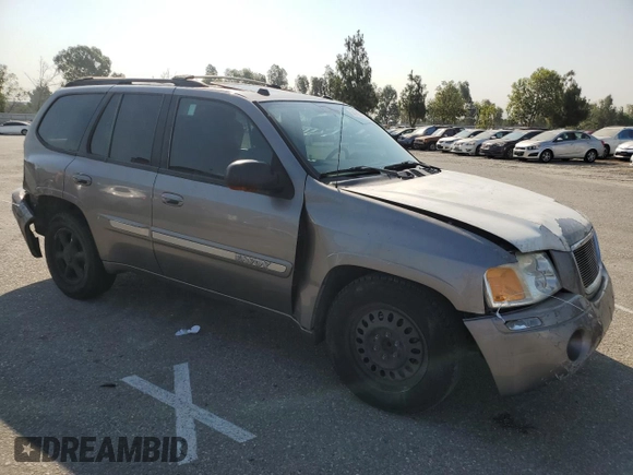 2005 GMC Envoy SLT with VIN 1GKDS13S952382088, listed as a Copart auction lot 64765154 with 177,333 mi miles and Salvage Title. Bid and sale history available at carsss.com. Image 4.