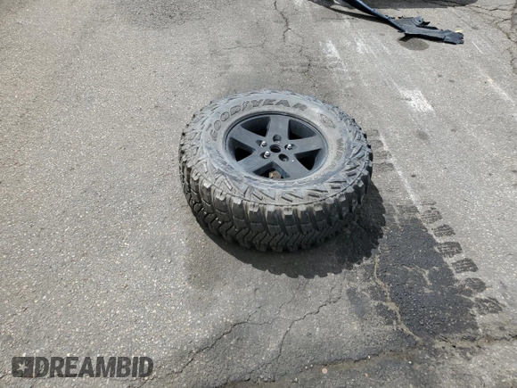 2012 Jeep Wrangler Sport with VIN 1C4AJWAG4CL278063, listed as a Copart auction lot 56313005 with 109,998 mi miles and Salvage title. Bid and sale history available at DreamBid. Image 12.