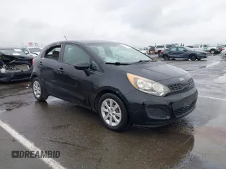 2013 Kia Rio LX with VIN KNADM5A35D6302623, listed as a IAAI auction lot 41626083 with 114,132 mi miles. Bid and sale history available at carsss.com. Image 1.