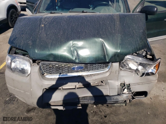 2002 Ford Escape Limited with VIN 1FMCU04162KA51672, listed as a Copart auction lot 74035414 with 140,752 mi miles and Salvage Title. Bid and sale history available at carsss.com. Image 11.