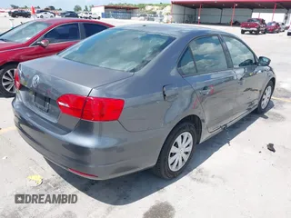 2014 Volkswagen Jetta S with VIN 3VW2K7AJ0EM217942, listed as a IAAI auction lot 42665485 with 140,084 mi miles and . Bid and sale history available at DreamBid. Image 4.