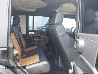 2008 Jeep Wrangler Unlimited X z VIN 1J4GA39148L560004, wystawiony jako IAAI lot #42523657 z przebiegiem 116 619 mil mil oraz . Historia ofert i sprzedaży dostępna na DreamBid. Obrazek 8.