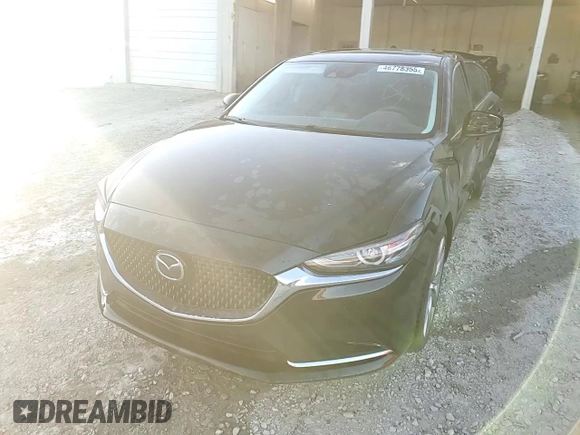 2021 Mazda 6 Carbon Edition with VIN JM1GL1WY9M1605756, listed as a Copart auction lot 46778355 with 60,063 mi miles and Salvage Title. Bid and sale history available at DreamBid. Image 13.
