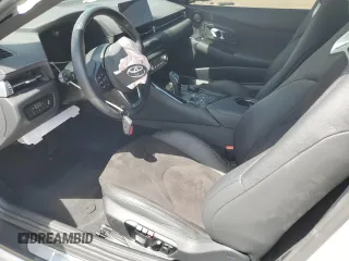 2025 Toyota GR Supra 3.0 with VIN WZ1DB0G09SW069188, listed as a Copart auction lot 49242215 with 0 mi miles and Salvage Title. Bid and sale history available at carsss.com. Image 7.