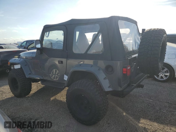 1997 Jeep Wrangler Sport with VIN 1J4FY19S5VP520801, listed as a Copart auction lot 75301274 with Not Provided miles and Non Repairable. Bid and sale history available at carsss.com. Image 2.