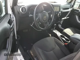 2016 Jeep Wrangler Sahara с VIN 1C4AJWBG4GL234262, выставлен на аукционе Copart как лот 58742355 с пробегом 133 152 миль миль и Списание • Salvage title. История ставок и продаж доступна на DreamBid. Изображение 8.