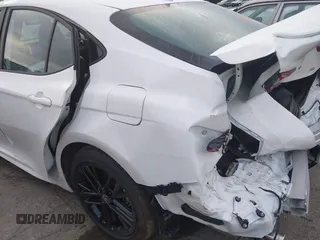 2025 Toyota Camry LE z VIN 4T1DAACK7SU152544, wystawiony jako IAAI lot #42489001 z przebiegiem 1 308 mil mil oraz . Historia ofert i sprzedaży dostępna na DreamBid. Obrazek 17.