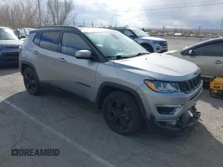 2020 Jeep Compass Latitude with VIN 3C4NJCBBXLT158887, listed as a IAAI auction lot 41752495 with 95,429 mi miles and . Bid and sale history available at DreamBid. Image 1.