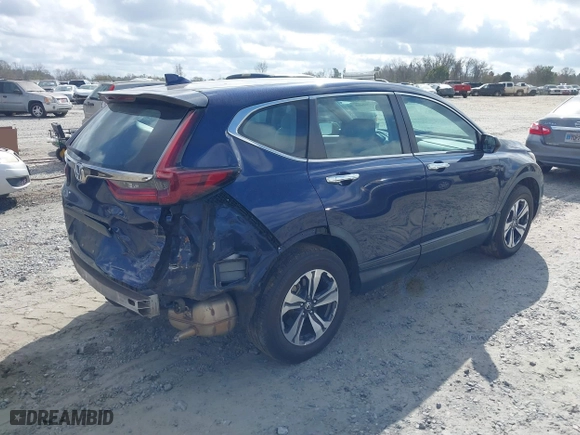 2020 Honda CR-V LX with VIN 5J6RW1H26LL004200, listed as a IAAI auction lot 41560668 with 85,628 mi miles. Bid and sale history available at carsss.com. Image 4.