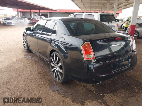 2012 Chrysler 300 S with VIN 2C3CCABGXCH313095, listed as a IAAI auction lot 41789401 with 186,302 mi miles and . Bid and sale history available at carsss.com. Image 3.