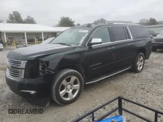 2016 Chevrolet Suburban LTZ with VIN 1GNSCJKCXGR278978, listed as a Copart auction lot 82280113 with 158,111 mi miles and Salvage title. Bid and sale history available at DreamBid. Image 1.