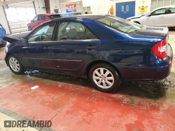 2004 Toyota Camry LE with VIN 4T1BF32K64U072368, listed as a Copart auction lot 51821965 with 136,646 mi miles and Salvage Title. Bid and sale history available at DreamBid. Image 2.