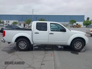 2016 Nissan Frontier SV z VIN 1N6AD0ER7GN737013, wystawiony jako IAAI lot #42106586 z przebiegiem 54 218 mil mil oraz . Historia ofert i sprzedaży dostępna na DreamBid. Obrazek 13.