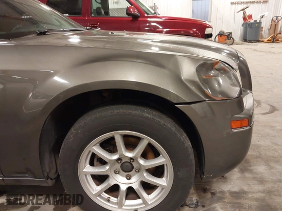2010 Chrysler 300 Touring with VIN 2C3CA5CV9AH213299, listed as a IAAI auction lot 41754215 with 172,467 mi miles. Bid and sale history available at carsss.com. Image 19.