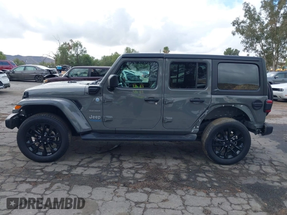 2021 Jeep Wrangler Unlimited Sahara with VIN 1C4JJXP64MW720263, listed as a IAAI auction lot 41514302 with 73,300 mi miles and . Bid and sale history available at DreamBid. Image 15.