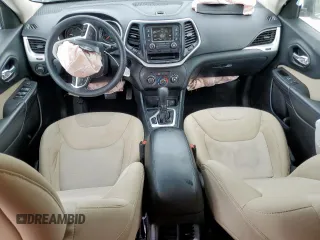 2015 Jeep Cherokee Sport with VIN 1C4PJLAB9FW632112, listed as a Copart auction lot 63265295 with 83,301 mi miles and Salvage title. Bid and sale history available at DreamBid. Image 8.