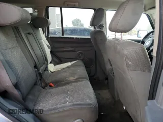 2007 Jeep Commander Sport z VIN 1J8HG48K97C505712, wystawiony jako Copart lot #72011114 z przebiegiem 146 981 mil mil oraz Szkoda całkowita • Salvage title. Historia ofert i sprzedaży dostępna na DreamBid. Obrazek 10.