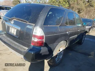 2004 Acura MDX Touring Pkg w/Navigation with VIN 2HNYD18834H511298, listed as a IAAI auction lot 41431863 with 246,274 mi miles. Bid and sale history available at carsss.com. Image 4.