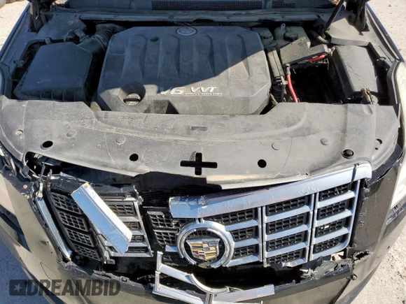 2014 Cadillac XTS Luxury z VIN 2G61M5S39E9302853, wystawiony jako Copart lot #57712215 z przebiegiem 180 886 mil mil oraz Czysty tytuł • Clean title. Historia ofert i sprzedaży dostępna na DreamBid. Obrazek 11.