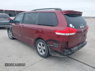 2014 Toyota Sienna LE AAS with VIN 5TDKK3DC6ES487962, listed as a IAAI auction lot 41568458 with 164,043 mi miles. Bid and sale history available at carsss.com. Image 3.
