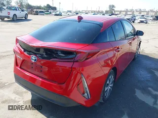 2020 Toyota Prius LE with VIN JTDKARFP8L3154280, listed as a IAAI auction lot 42405444 with 57,134 mi miles and . Bid and sale history available at DreamBid. Image 4.