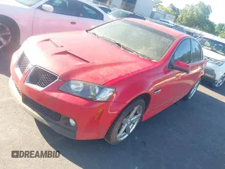 2009 Pontiac G8 GT z VIN 6G2EC57Y69L169285, wystawiony jako IAAI lot #42339645 z przebiegiem 128 306 mil mil oraz . Historia ofert i sprzedaży dostępna na DreamBid. Obrazek 2.