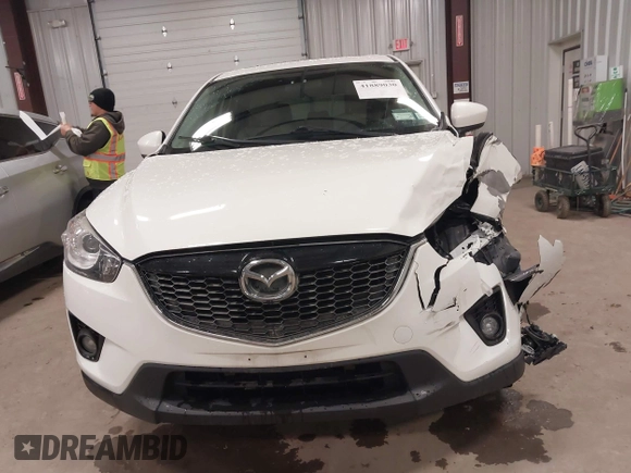 2014 Mazda CX-5 Grand Touring with VIN JM3KE4DY3E0374036, listed as a IAAI auction lot 41889030 with 162,611 mi miles and . Bid and sale history available at DreamBid. Image 12.
