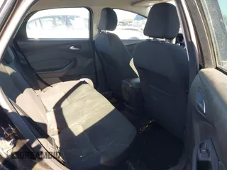 2015 Ford Focus SE with VIN 1FADP3F21FL385654, listed as a IAAI auction lot 42306171 with 187,725 mi miles and . Bid and sale history available at DreamBid. Image 8.