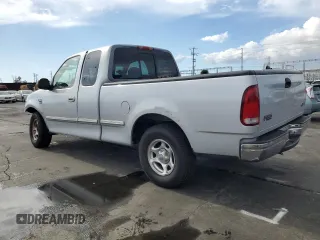 1998 Ford F-150 XL with VIN 1FTRX17L3WKB36791, listed as a Copart auction lot 42141915 with 201,067 mi miles and Salvage title. Bid and sale history available at DreamBid. Image 2.