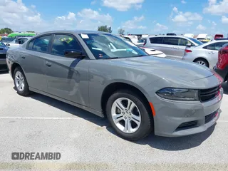 2023 Dodge Charger SXT with VIN 2C3CDXBG5PH638680, listed as a IAAI auction lot 39678284 with 24,364 mi miles. Bid and sale history available at carsss.com. Image 1.