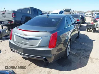 2017 Cadillac CTS RWD with VIN 1G6AP5SX7H0153593, listed as a IAAI auction lot 41627882 with 113,758 mi miles and . Bid and sale history available at DreamBid. Image 4.