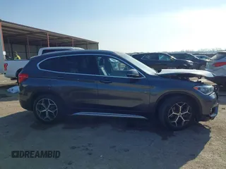 2016 BMW X1 xDrive28i with VIN WBXHT3Z35G4A49941, listed as a IAAI auction lot 41789774 with 111,661 mi miles and . Bid and sale history available at DreamBid. Image 13.
