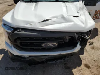 2022 Ford F-150 XL z VIN 1FTFX1E86NKD22373, wystawiony jako Copart lot #69963114 z przebiegiem 96 983 mil mil oraz Szkoda całkowita • Salvage title. Historia ofert i sprzedaży dostępna na DreamBid. Obrazek 11.