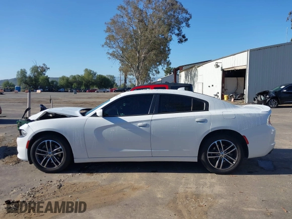 2019 Dodge Charger SXT with VIN 2C3CDXJGXKH533322, listed as a IAAI auction lot 41808838 with 95,877 mi miles and . Bid and sale history available at DreamBid. Image 15.