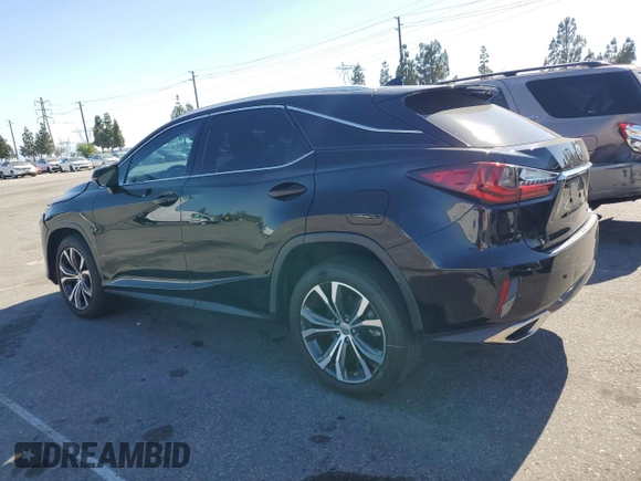2016 Lexus RX 350 with VIN 2T2ZZMCA0GC023332, listed as a Copart auction lot 62332845 with 57,971 mi miles and Salvage title. Bid and sale history available at DreamBid. Image 2.