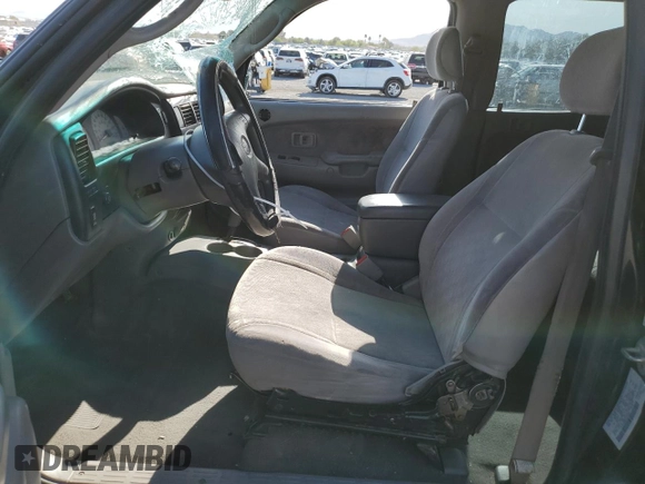 2003 Toyota Tacoma PreRunner z VIN 5TEGN92N43Z196106, wystawiony jako Copart lot #52205315 z przebiegiem 290 000 mil mil oraz Szkoda całkowita • Salvage title. Historia ofert i sprzedaży dostępna na DreamBid. Obrazek 7.