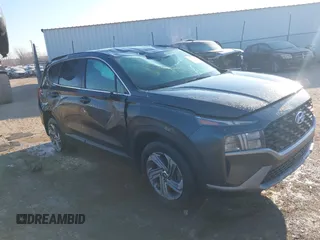 2021 Hyundai Santa Fe SE with VIN 5NMS1DAJXMH352741, listed as a IAAI auction lot 41273105 with 58,033 mi miles. Bid and sale history available at carsss.com. Image 1.