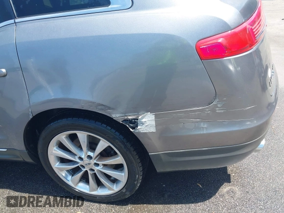2010 Lincoln MKT EcoBoost with VIN 2LMHJ5AT7ABJ25423, listed as a IAAI auction lot 42048594 with 211,204 mi miles and . Bid and sale history available at DreamBid. Image 6.