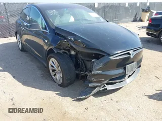 2019 Tesla Model X 75D with VIN 5YJXCBE22KF184504, listed as a IAAI auction lot 41802023 with 137,094 mi miles. Bid and sale history available at carsss.com. Image 6.