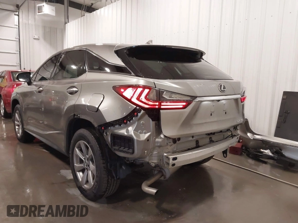 2018 Lexus RX 350 with VIN 2T2BZMCA7JC163886, listed as a IAAI auction lot 42248863 with 57,319 mi miles and . Bid and sale history available at DreamBid. Image 6.